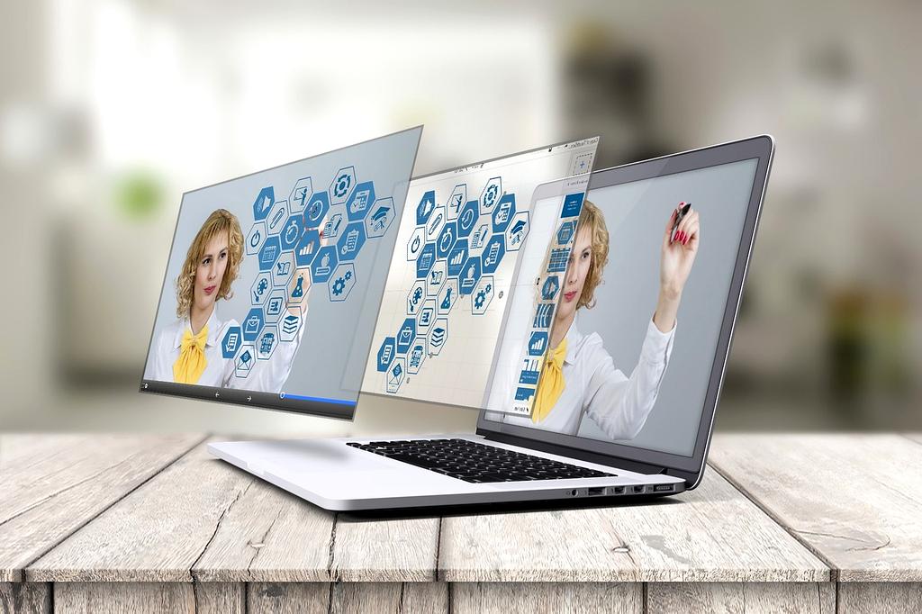 Holographic projection system with volumetric display technology